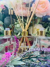 Load image into Gallery viewer, Lavender Bliss - A rich full aromatic treasure that will fill your desired space with familiar comforting notes of lavender, patchouli and orange. Lavender Bliss is recommended to use with 8 reeds in wide open spaces such as family rooms, entry ways and any doorless space in your home, business or worship center. In smaller spaces with doors, 4-5 reeds should be used.